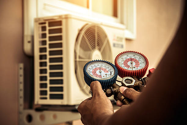 Professional Air Conditioning Service technician working in Franklin, WI